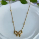 Lumière Bow Necklace - 18K Gold Plated